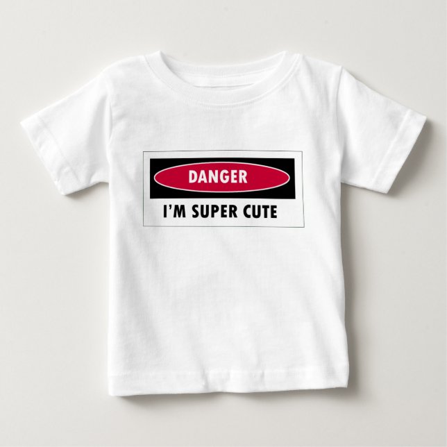 CAMISETA DE BEBÉ PELIGRO DE QUE SEA SUPER CUTE (Anverso)