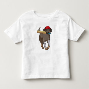 Camiseta De Bebé Perro en el críquet con bate de críquet