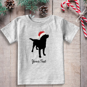 Camiseta De Bebé Perro negro del laboratorio con el gorra de Santa
