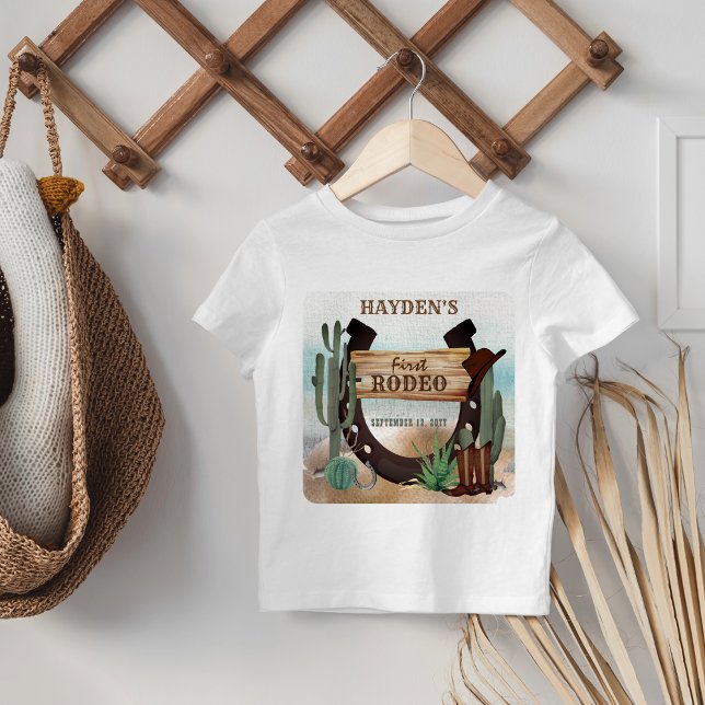 Camiseta De Bebé Primer Rodeo Cowboy Fiesta Occidental Primer Cumpl (Boy's Rustic Western "First Rodeo" 1st Birthday Party T-Shirt for Baby | Toddler)