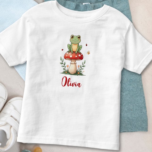 Camiseta De Bebé Rana Cuta en hongos rojos (Subido por el creador)