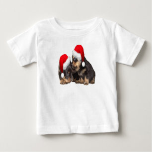 Camiseta De Bebé Rottweilers de Navidad con sombreros festivos de v