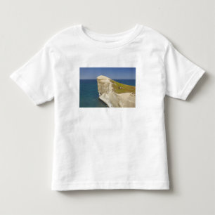 Camiseta De Bebé Turistas en la cima del acantilado en Tunnel Beach