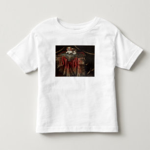 Camiseta De Bebé Un perro de aguas asentado en un amortiguador