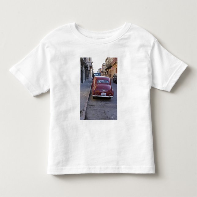 Camiseta De Bebé Un viejo y clásico coche peugeot aparcado en una c (Anverso)