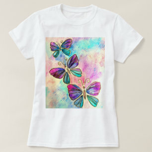Camiseta de mariposas voladoras rosadas púrpura