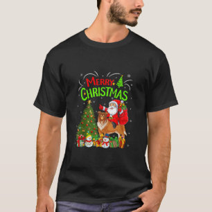 Camiseta Decoraciones navideñas iluminan Santa Riding Colli