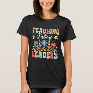 Camiseta del primer día de escuela enseñando a fut