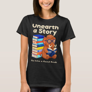 Camiseta Descubre una historia leyendo un libro prehistóric