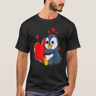 Camiseta Día de San Valentín de pingüino lindo sosteniendo 