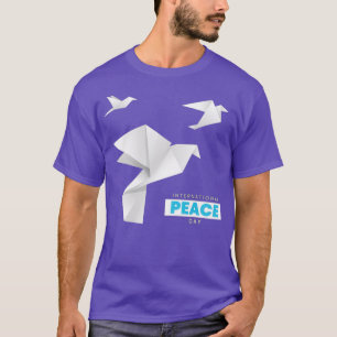 Camiseta Día Internacional de la Paz con palomas de origami