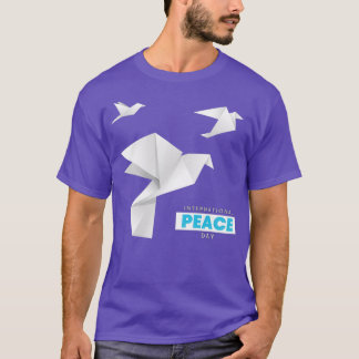 Camiseta Día Internacional de la Paz con palomas de origami