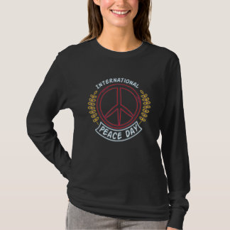 Camiseta Día Internacional de la Paz Signo de Paz Neon para