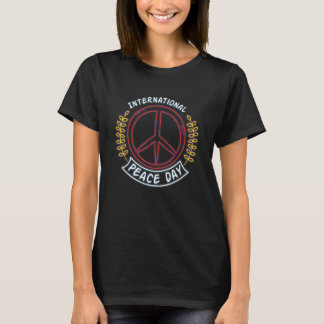 Camiseta Día Internacional de la Paz Signo de Paz Neon para