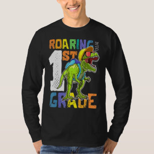 Camiseta Dinosaurio de primer grado vuelve a la mochila esc