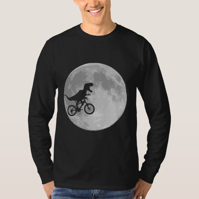 Camiseta Dinosaurio en bicicleta en cielo con luna (Anverso)