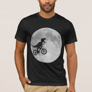 Camiseta Dinosaurio en bicicleta en cielo con luna