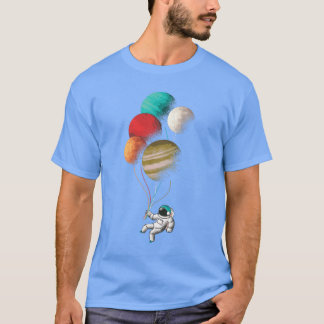 Camiseta Diseño astronauta con globos planetarios 