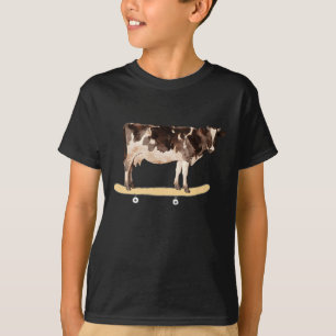 Camiseta divertida de vaca haciendo skateboard