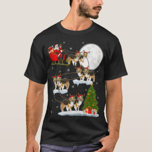 Camiseta Divertido árbol de alumbrado navideño Santa Riding