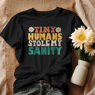 Camiseta Divertidos y pequeños seres humanos me robaron la 