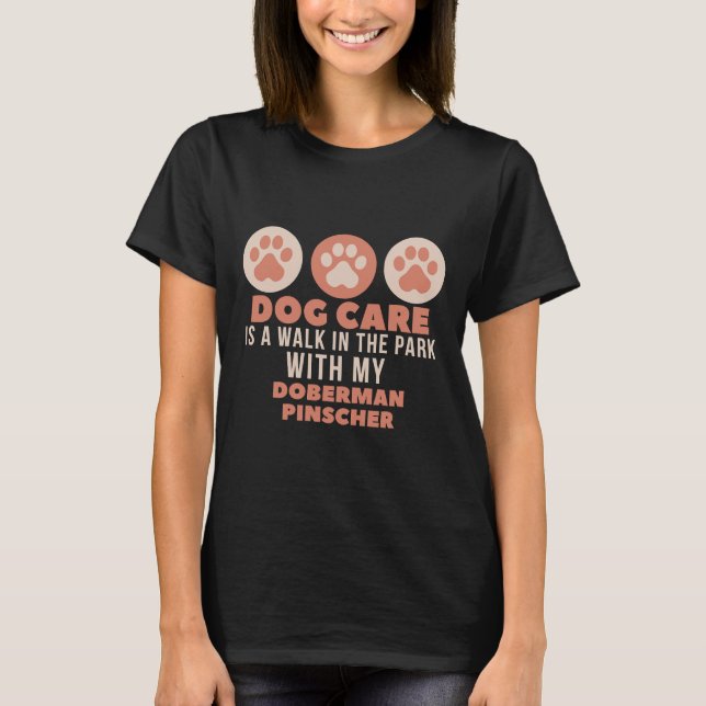 Camiseta Dog Care Is Walk In The Park With My Doberman Pins (Anverso)