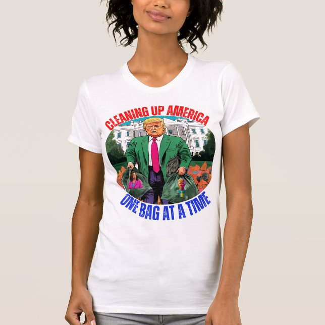 CAMISETA DONALD TRUMP LIMPIANDO A ESTADOS UNIDOS UNA BOLSA  (Anverso)