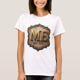 Camiseta Dorado con texto ME EST 1973 diseño vanguardista