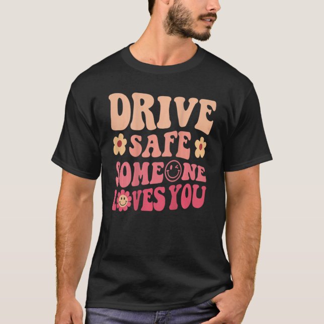 Camiseta Drive Safe Alguien ama tu sonrisa de flor Positiva (Anverso)