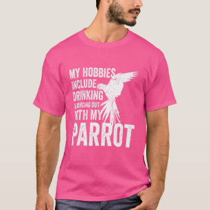 Camiseta Dueño de loro y criador Mis aficiones incluyen beb