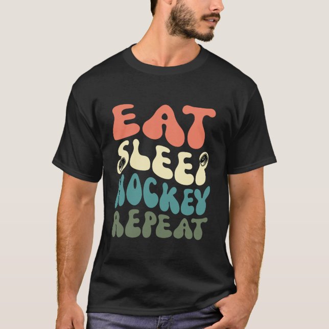 Camiseta Eat Sleep Hockey Repetir divertida cosecha retro v (Anverso)