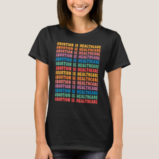 Camiseta El aborto es atención médica feminista retro pro-e