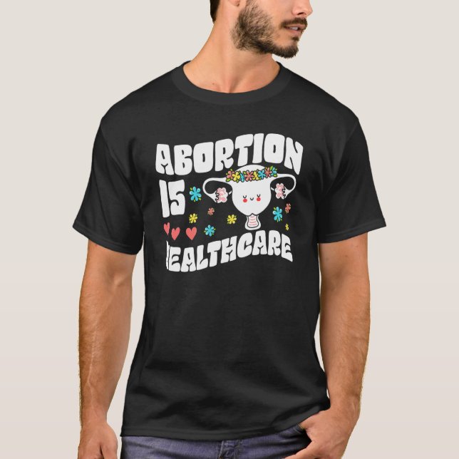 Camiseta El Aborto Es Flor Feminista Feminista De Salud Pr (Anverso)