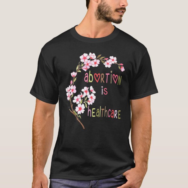 Camiseta El aborto es la elección de las flor de la salud (Anverso)