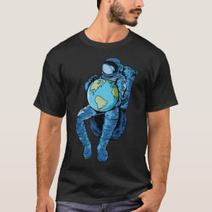 Camiseta El astronauta sostiene el planeta Tierra