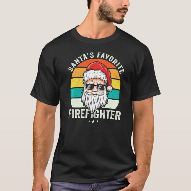 Camiseta El bombero voluntario favorito de Santa Claus es g (Anverso)