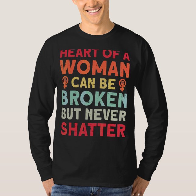 Camiseta El Corazón De Una Mujer Se Puede Romper Pero Nunca (Anverso)