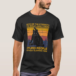 Camiseta El Gato Me Da Su Fuerza Para Alejarse Del Estúpido