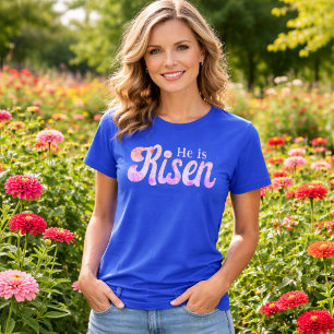 Camiseta Él ha resucitado Pastel Floral Pascua Cristiana
