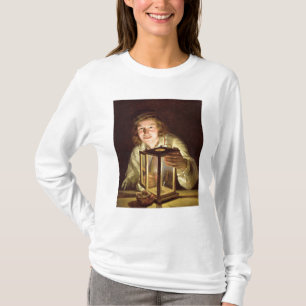 Camiseta El mozo de cuadra joven con una lámpara estable,