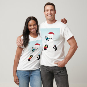 Camiseta El pingüino construye un invierno de nieve
