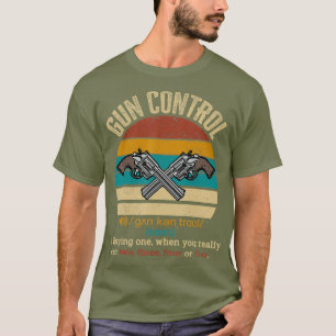 Camiseta El propietario de la pistola de regalo divertida d