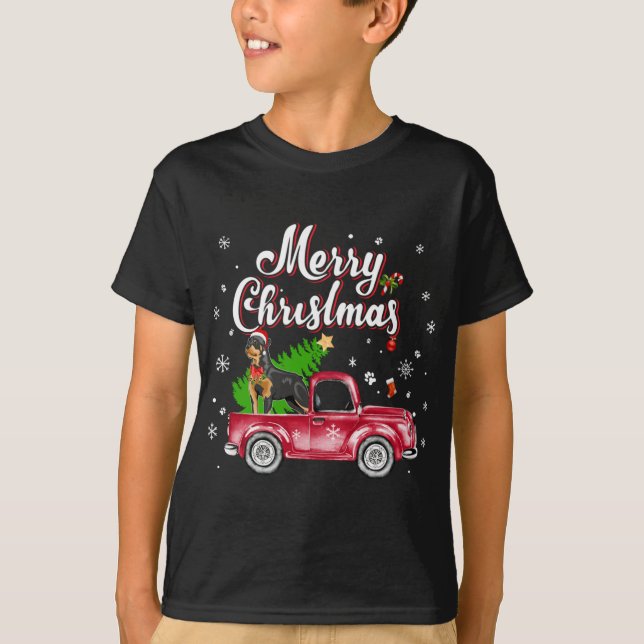 Camiseta El recuperador de Rottweiler viaja con Navidades d (Anverso)