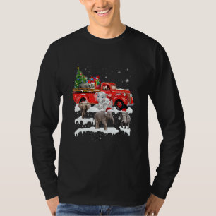 Camiseta Elefante montando Camión Rojo Navidad Feliz Navida