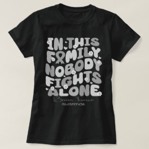 Camiseta En Esta Familia Nadie Lucha Solo Contra El Tumor C