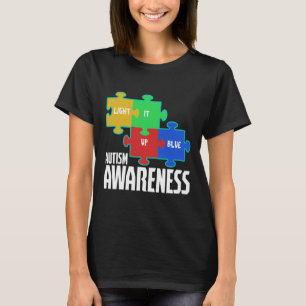 Camiseta Enciende el rompecabezas azul Consciente del Autis