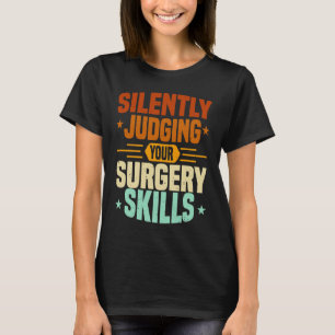 Camiseta Enfermera de Anestesia Juzgando Habilidades de Cir