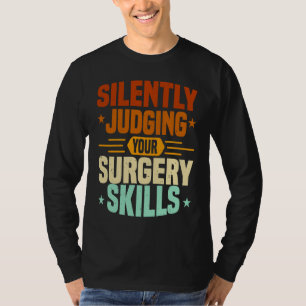 Camiseta Enfermera de Anestesia Juzgando Habilidades de Cir