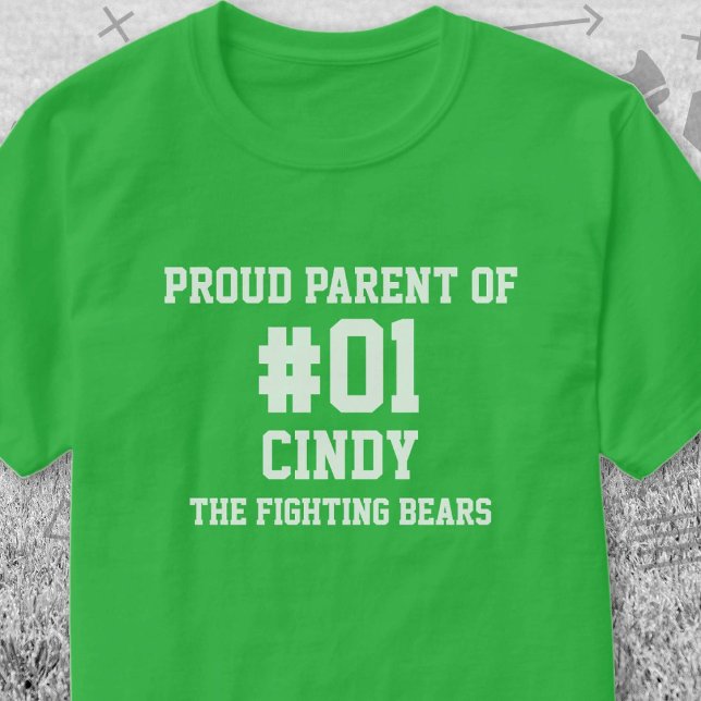 Camiseta Equipo blanco verde de béisbol (
Green and White Baseball Proud Parent of T-Shirt. Celebrate your high school or college athlete.)