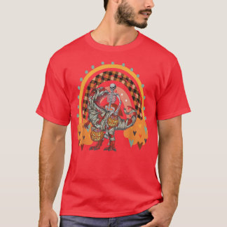 Camiseta Esqueleto de Rainbow Halloween montando momia dino